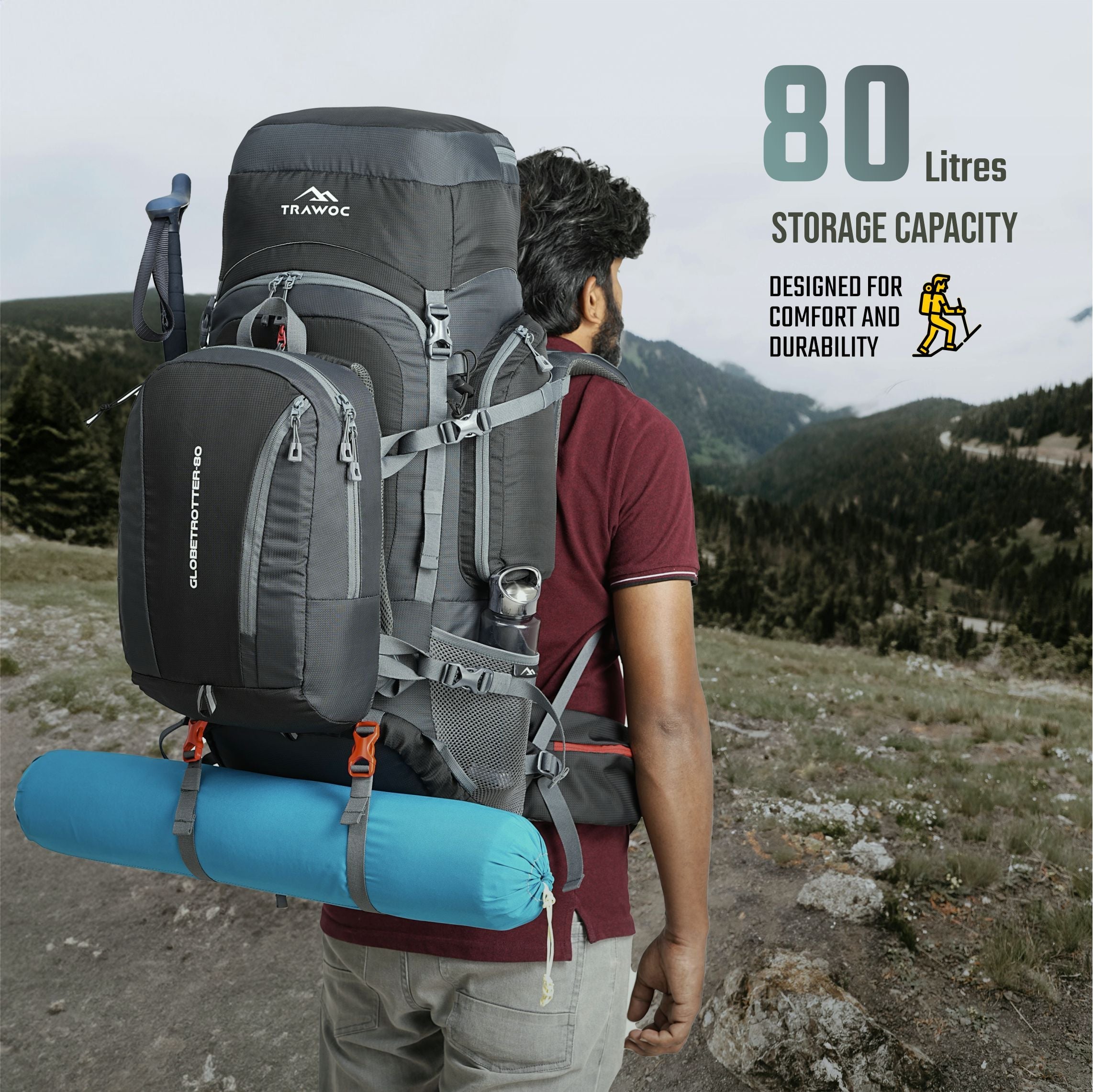 Image of a person wearing the GLOBETROTTER-80 Rucksack in grey, demonstrating its ergonomic design with padded shoulder straps and an adjustable hip belt, set against a picturesque outdoor landscape, showcasing the rucksack's functionality and style during a hiking or travel adventure.