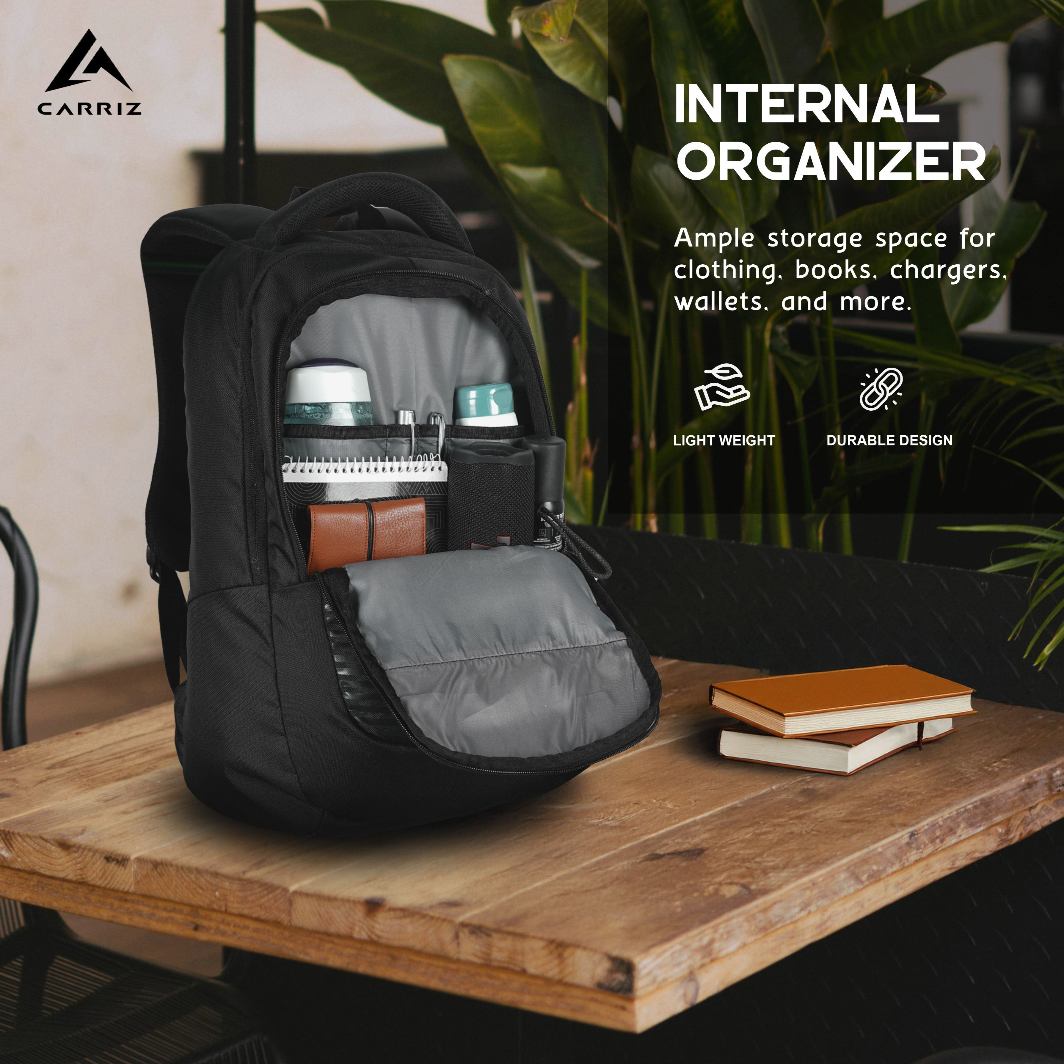 Internal organizer view of the CPB06 25L Laptop Backpack in black, showcasing its thoughtfully designed compartments for efficient storage. The image highlights a spacious main compartment with a padded laptop sleeve that securely holds devices up to 15.6 inches, along with multiple pockets for organizing smaller items such as pens, chargers, and notebooks.