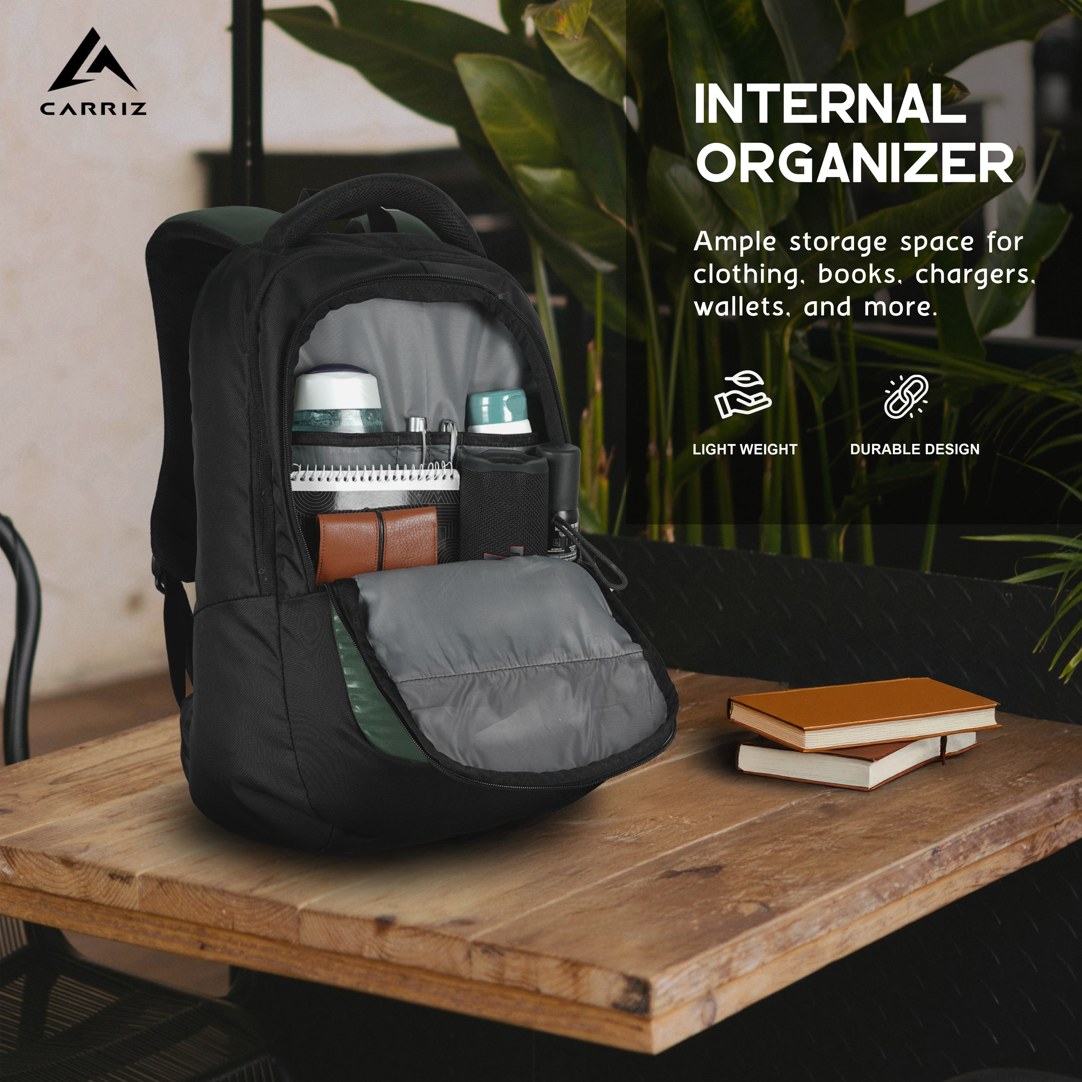 Interior view of the CPB06 25L Laptop Backpack in green, showcasing its well-organized internal compartments. The main compartment features a padded laptop sleeve designed to securely hold most 15-inch laptops, along with multiple pockets for efficient organization of accessories. These pockets are ideal for storing items such as pens, a phone, and chargers, ensuring easy access and protection.